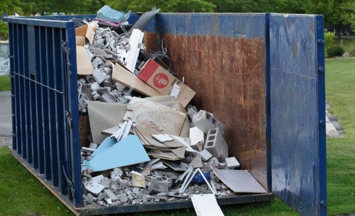 Sorting recyclables at a commercial premises with clear signage